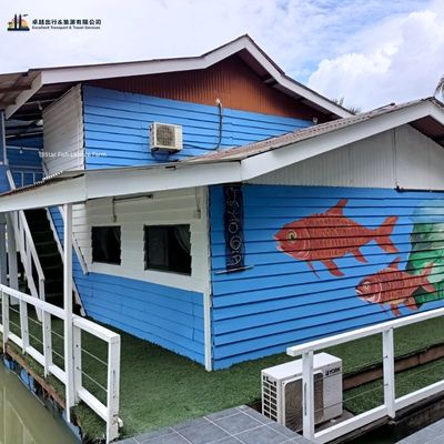 Star Fish Leisure Farm homestay chalet exterior with fish mural